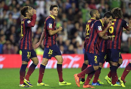 Barcelona's Neymar (L) celebrates with teammates after scoring against Real Betis during their Spanish First Division soccer match at Benito Barcelona's Neymar (L) celebrates with teammates after scoring against Real Betis during their Spanish First Division soccer match at Benito