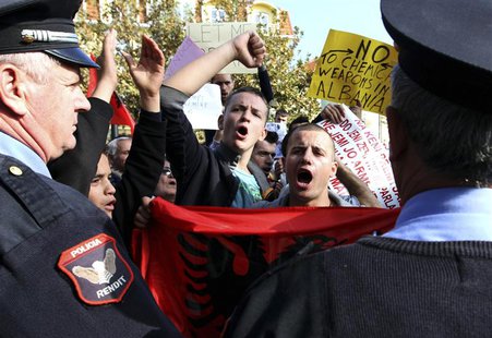 Demonstrators protest against the potential dismantling of Syrian chemical weapons in Albania in front of the Parliament in Tirana in this N Demonstrators protest against the potential dismantling of Syrian chemical weapons in Albania in front of the Parliament in Tirana in this N