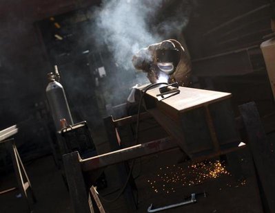 A welder works on a beam at a welding company in San Francisco, California January 10, 2013. REUTERS/Robert Galbraith A welder works on a beam at a welding company in San Francisco, California January 10, 2013. REUTERS/Robert Galbraith