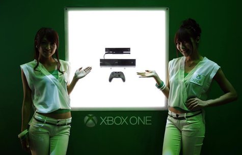 Booth girls stand next to Microsoft's new game console Xbox One at the Tokyo Game Show in Chiba, east of Tokyo September 19, 2013. REUTERS/Y Booth girls stand next to Microsoft's new game console Xbox One at the Tokyo Game Show in Chiba, east of Tokyo September 19, 2013. REUTERS/Y