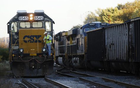 A CSX coal train (R) moves past an idling CSX engine at the switchyard in Brunswick, Maryland October 16, 2012. REUTERS/Gary Cameron A CSX coal train (R) moves past an idling CSX engine at the switchyard in Brunswick, Maryland October 16, 2012. REUTERS/Gary Cameron