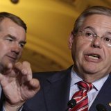 Senate Foreign Relations Committee Chairman Robert Menendez (D-NJ) speaks to the media after the Senate passed the immigration bill on Capit Senate Foreign Relations Committee Chairman Robert Menendez (D-NJ) speaks to the media after the Senate passed the immigration bill on Capit