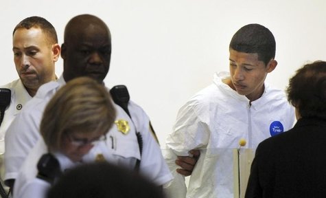 Philip Chism, 14, stands during his arraignment for the death of Danvers High School teacher Colleen Ritzer in Salem District Court in Bosto Philip Chism, 14, stands during his arraignment for the death of Danvers High School teacher Colleen Ritzer in Salem District Court in Bosto