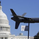 Demonstrators deploy a model of a U.S. drone aircraft at the "Stop Watching Us: A Rally Against Mass Surveillance" near the U.S. Capitol in Demonstrators deploy a model of a U.S. drone aircraft at the "Stop Watching Us: A Rally Against Mass Surveillance" near the U.S. Capitol in