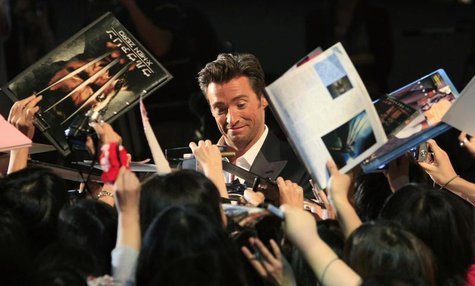 Actor Hugh Jackman signs autographs for fans at a red carpet event for the Japan premiere of "X-men Origins: Wolverine" in Tokyo September 3 Actor Hugh Jackman signs autographs for fans at a red carpet event for the Japan premiere of "X-men Origins: Wolverine" in Tokyo September 3