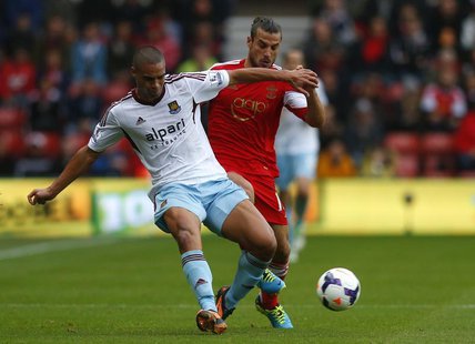 Southampton's Dani Osvaldo (R) tackles West Ham's Winston Reid during their English Premier League soccer match at St Mary's stadium in Sout Southampton's Dani Osvaldo (R) tackles West Ham's Winston Reid during their English Premier League soccer match at St Mary's stadium in Sout