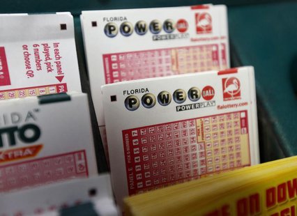 Tickets for the Florida Lottery Powerball are displayed at the Lawrence Shell gas station in Boynton Beach, Florida May 18, 2013. REUTERS/Jo Tickets for the Florida Lottery Powerball are displayed at the Lawrence Shell gas station in Boynton Beach, Florida May 18, 2013. REUTERS/Jo
