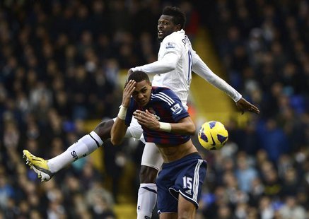 Tottenham Hotspur's Emmanuel Adebayor (R) challenges Stoke City's Steven N'Zonzi during their English Premier League soccer match at White H Tottenham Hotspur's Emmanuel Adebayor (R) challenges Stoke City's Steven N'Zonzi during their English Premier League soccer match at White H
