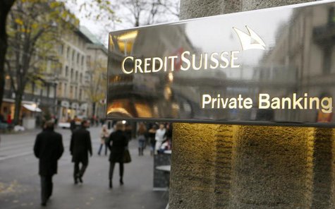 The logo of Swiss bank Credit Suisse is seen in front of a branch office in Zurich November 21, 2013. REUTERS/Arnd Wiegmann The logo of Swiss bank Credit Suisse is seen in front of a branch office in Zurich November 21, 2013. REUTERS/Arnd Wiegmann