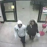 This surveillance photo shows the suspects in a Nov. 21, 2013 purse snatching at an Appleton grocery store. This surveillance photo shows the suspects in a Nov. 21, 2013 purse snatching at an Appleton grocery store.