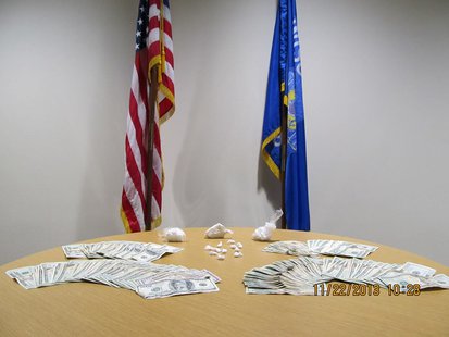 Drugs and cash confiscated by Wisconsin Rapids Police during warrant search Drugs and cash confiscated by Wisconsin Rapids Police during warrant search