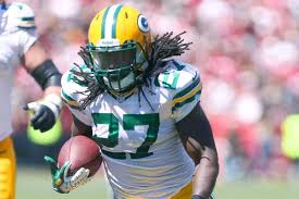 Eddie Lacy running the ball during game. Eddie Lacy running the ball during game.