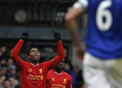 Liverpool's Daniel Sturridge (C) celebrates after scoring a goal against Everton during their English Premier League soccer match at Goodiso Liverpool's Daniel Sturridge (C) celebrates after scoring a goal against Everton during their English Premier League soccer match at Goodiso