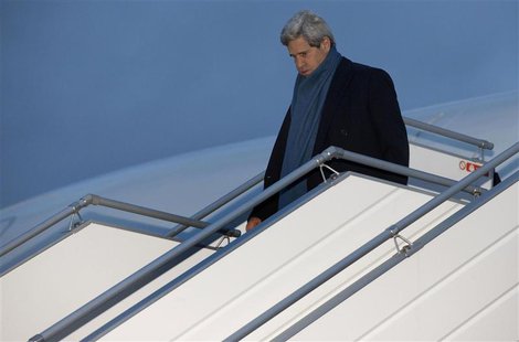 U.S. Secretary of State John Kerry walks down the steps of his aircraft as he arrives at Geneva International airport November 23, 2013. REU U.S. Secretary of State John Kerry walks down the steps of his aircraft as he arrives at Geneva International airport November 23, 2013. REU