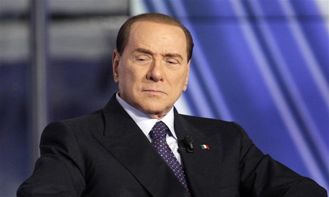 Italy's former Prime Minister Silvio Berlusconi appears as a guest on the RAI television show Porta a Porta (Door to Door) in Rome January 9 Italy's former Prime Minister Silvio Berlusconi appears as a guest on the RAI television show Porta a Porta (Door to Door) in Rome January 9