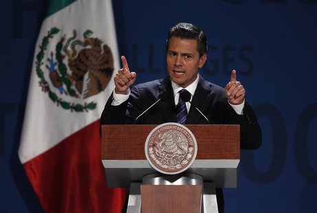 Mexico's President Enrique Pena Nieto addresses the audience during The Economist's Mexico Summit 2013 in Mexico City November 7, 2013. REUT Mexico's President Enrique Pena Nieto addresses the audience during The Economist's Mexico Summit 2013 in Mexico City November 7, 2013. REUT