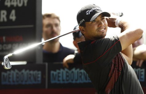 Australia's Jason Day plays a tee shot on the 12th hole during the final round of the World Cup of Golf at The Royal Melbourne Golf Club in Australia's Jason Day plays a tee shot on the 12th hole during the final round of the World Cup of Golf at The Royal Melbourne Golf Club in