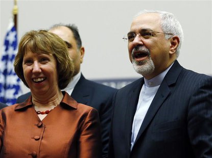 European Union foreign policy chief Catherine Ashton (L) smiles next to Iranian Foreign Minister Mohammad Javad Zarif during a ceremony at t European Union foreign policy chief Catherine Ashton (L) smiles next to Iranian Foreign Minister Mohammad Javad Zarif during a ceremony at t