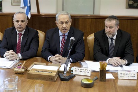 Israel's Prime Minister Benjamin Netanyahu (C) attends the weekly cabinet meeting in Jerusalem November 24, 2013. REUTERS/Abir Sultan/Pool Israel's Prime Minister Benjamin Netanyahu (C) attends the weekly cabinet meeting in Jerusalem November 24, 2013. REUTERS/Abir Sultan/Pool