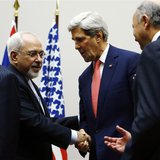 U.S. Secretary of State John Kerry (R) shakes hands with Iranian Foreign Minister Mohammad Javad Zarif after a ceremony at the United Nation U.S. Secretary of State John Kerry (R) shakes hands with Iranian Foreign Minister Mohammad Javad Zarif after a ceremony at the United Nation