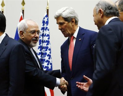 U.S. Secretary of State John Kerry (R) shakes hands with Iranian Foreign Minister Mohammad Javad Zarif after a ceremony at the United Nation U.S. Secretary of State John Kerry (R) shakes hands with Iranian Foreign Minister Mohammad Javad Zarif after a ceremony at the United Nation