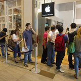 People line up outside an Apple reseller retail shop during the launch of the Apple iPad in Singapore in this July 23, 2010 file photo. REUT People line up outside an Apple reseller retail shop during the launch of the Apple iPad in Singapore in this July 23, 2010 file photo. REUT