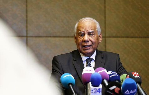 Egypt's Prime Minister Hazem el-Beblawi speaks during a news conference in Abu Dhabi October 27, 2013. REUTERS/Ben Job Egypt's Prime Minister Hazem el-Beblawi speaks during a news conference in Abu Dhabi October 27, 2013. REUTERS/Ben Job