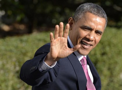 U.S. President Barack Obama waves to the press as he departs the White House, in Washington, November 24, 2013, for a 3-day swing trip to Se U.S. President Barack Obama waves to the press as he departs the White House, in Washington, November 24, 2013, for a 3-day swing trip to Se