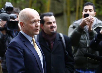 British Foreign Secretary William Hague talks to media after his arrival at the Intercontinental Hotel in Geneva November 23, 2013. REUTERS/ British Foreign Secretary William Hague talks to media after his arrival at the Intercontinental Hotel in Geneva November 23, 2013. REUTERS/