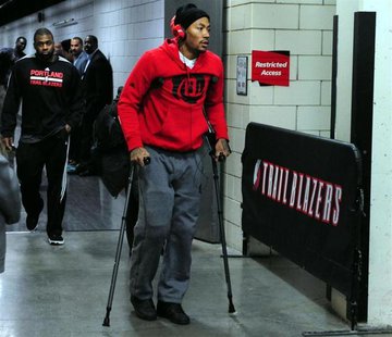 Nov 22, 2013; Portland, OR, USA; Chicago Bulls point guard Derrick Rose (1) walks out of the Moda Center on crutches after being injured in Nov 22, 2013; Portland, OR, USA; Chicago Bulls point guard Derrick Rose (1) walks out of the Moda Center on crutches after being injured in