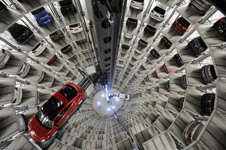 A Volkswagen "Beetle" (L) and an "UP!" are pictured in a delivery tower at the company's headquarter in Wolfsburg, March 12, 2012. REUTERS/F A Volkswagen "Beetle" (L) and an "UP!" are pictured in a delivery tower at the company's headquarter in Wolfsburg, March 12, 2012. REUTERS/F