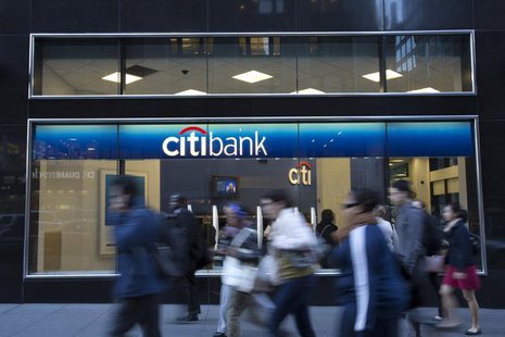 People walk past a Citibank branch in New York October 15, 2013. REUTERS/Andrew Kelly People walk past a Citibank branch in New York October 15, 2013. REUTERS/Andrew Kelly