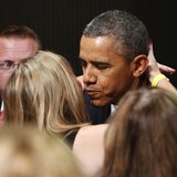 U.S. President Barack Obama kisses a member of the audience as he participates in a Democratic Party fundraiser in San Francisco November 25 U.S. President Barack Obama kisses a member of the audience as he participates in a Democratic Party fundraiser in San Francisco November 25