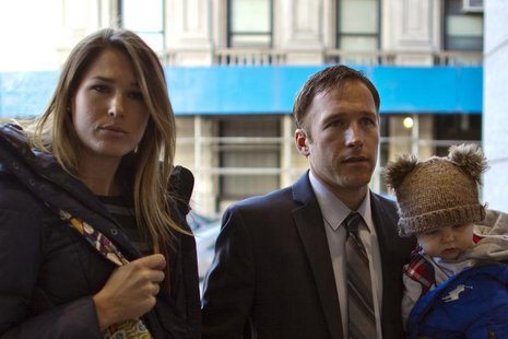 Olympic alpine skier Bode Miller arrives with his wife Morgan and his son at Manhattan's Family Court in New York, November 25, 2013. REUTER Olympic alpine skier Bode Miller arrives with his wife Morgan and his son at Manhattan's Family Court in New York, November 25, 2013. REUTER