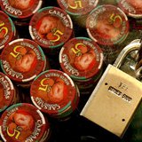 Roulette chips are locked down at Caesars in Atlantic City, New Jersey July 5, 2006. REUTERS/Tim Shaffer Roulette chips are locked down at Caesars in Atlantic City, New Jersey July 5, 2006. REUTERS/Tim Shaffer