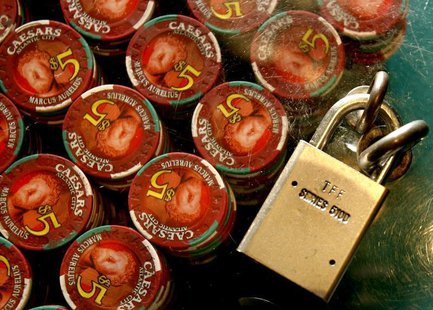 Roulette chips are locked down at Caesars in Atlantic City, New Jersey July 5, 2006. REUTERS/Tim Shaffer Roulette chips are locked down at Caesars in Atlantic City, New Jersey July 5, 2006. REUTERS/Tim Shaffer