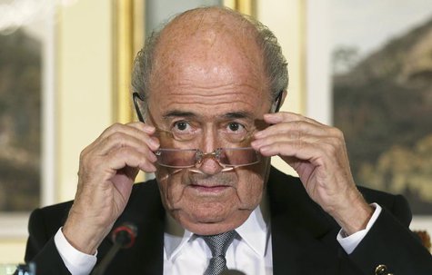 FIFA President Sepp Blatter looks on during a news conference in Doha November 9, 2013. REUTERS/Fadi Al-Assaad FIFA President Sepp Blatter looks on during a news conference in Doha November 9, 2013. REUTERS/Fadi Al-Assaad