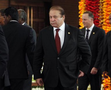 Pakistan's Prime Minister Nawaz Sharif arrives for the official photograph of the Commonwealth heads of states during the opening ceremony o Pakistan's Prime Minister Nawaz Sharif arrives for the official photograph of the Commonwealth heads of states during the opening ceremony o