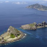 A group of disputed islands, Uotsuri island (top), Minamikojima (bottom) and Kitakojima, known as Senkaku in Japan and Diaoyu in China is se A group of disputed islands, Uotsuri island (top), Minamikojima (bottom) and Kitakojima, known as Senkaku in Japan and Diaoyu in China is se