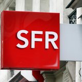 The logo of French mobile phone operator SFR is seen on a shop in Paris August 29, 2013. REUTERS/Charles Platiau The logo of French mobile phone operator SFR is seen on a shop in Paris August 29, 2013. REUTERS/Charles Platiau