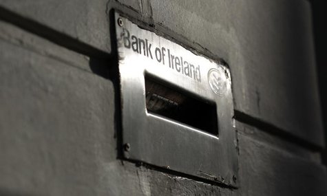 Sunlight is reflected off a deposit box on the exterior of a Bank Of Ireland branch in Belfast November 12, 2010. REUTERS/Cathal McNaughton Sunlight is reflected off a deposit box on the exterior of a Bank Of Ireland branch in Belfast November 12, 2010. REUTERS/Cathal McNaughton