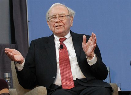 Warren Buffett, co-chair of the 10,000 Small Businesses Advisory Council, takes part in a panel discussion following a news conference annou Warren Buffett, co-chair of the 10,000 Small Businesses Advisory Council, takes part in a panel discussion following a news conference annou