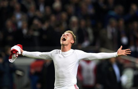 Ajax Amsterdam's player Viktor Fischer celebrates a victory against Barcelona after a Champions League group H soccer match at Amsterdam Are Ajax Amsterdam's player Viktor Fischer celebrates a victory against Barcelona after a Champions League group H soccer match at Amsterdam Are