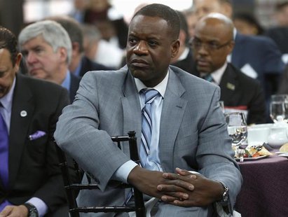 Detroit Emergency Manager Kevyn Orr listens to a panel discussion following a news conference announcing a $20 million partnership to bring Detroit Emergency Manager Kevyn Orr listens to a panel discussion following a news conference announcing a $20 million partnership to bring