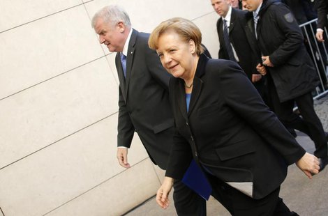 The head of the Christian Democratic Union (CDU) German Chancellor Angela Merkel (R) and the head of the Christian Social Union (CSU) Horst The head of the Christian Democratic Union (CDU) German Chancellor Angela Merkel (R) and the head of the Christian Social Union (CSU) Horst
