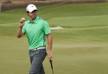 Rory McIlroy of Northern Ireland holds his ball on the second green during the third round of the DP World Tour Championship in Dubai Novemb Rory McIlroy of Northern Ireland holds his ball on the second green during the third round of the DP World Tour Championship in Dubai Novemb