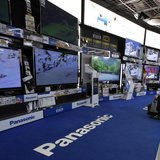 A man looks at Panasonic Corp's Viera televisions displayed at an electronics store in Tokyo October 31, 2013. REUTERS/Toru Hanai A man looks at Panasonic Corp's Viera televisions displayed at an electronics store in Tokyo October 31, 2013. REUTERS/Toru Hanai