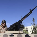 A member of the Libyan army guards the streets following yesterday's clashes in Benghazi November 26, 2013. REUTERS/Esam Omran Al-Fetori A member of the Libyan army guards the streets following yesterday's clashes in Benghazi November 26, 2013. REUTERS/Esam Omran Al-Fetori