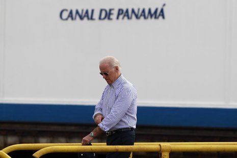 U.S. Vice President Joe Biden walks on top of the lock gates during a visit to the Miraflores Locks of the Panama Canal in Panama City Novem U.S. Vice President Joe Biden walks on top of the lock gates during a visit to the Miraflores Locks of the Panama Canal in Panama City Novem
