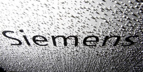 The company logo of Siemens is pictured after an annual news conference in Berlin November 7, 2013. REUTERS/Tobias Schwarz The company logo of Siemens is pictured after an annual news conference in Berlin November 7, 2013. REUTERS/Tobias Schwarz